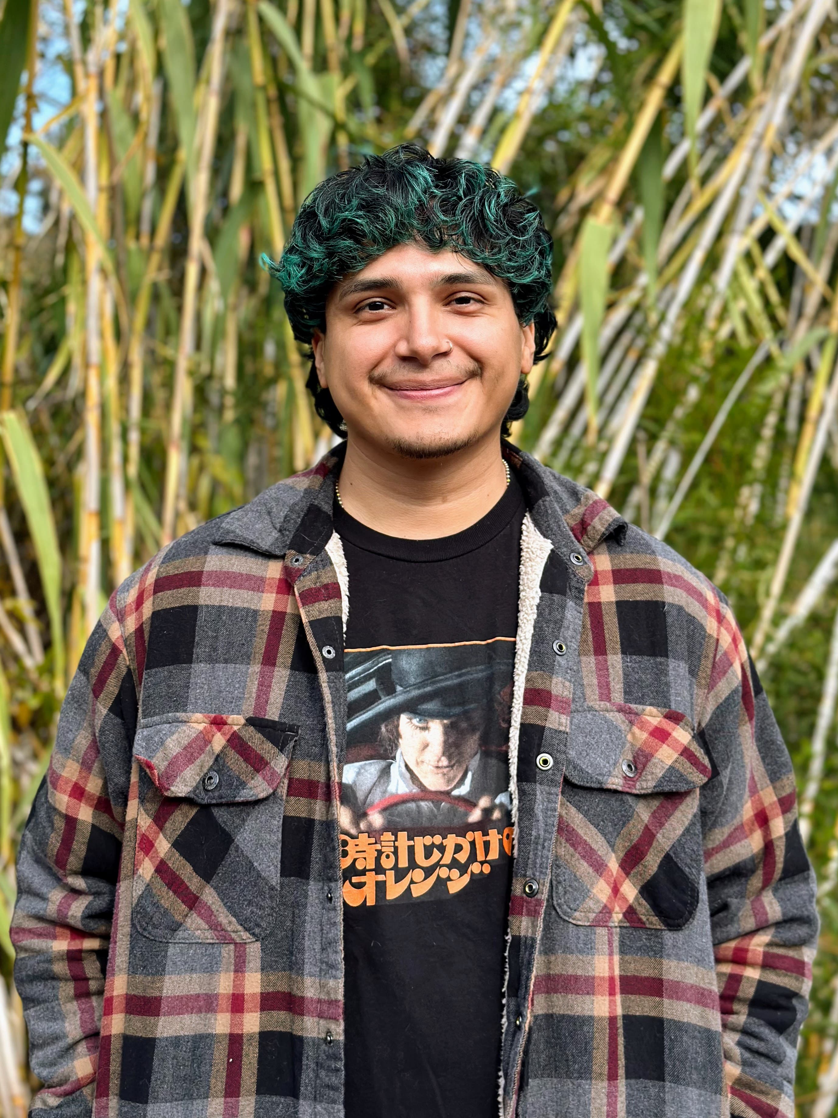 Portrait of Dorian Portillo (they/them)